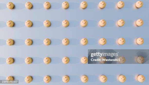 3d rendering of happy emoji patterns in rows on a blue background - goofy emoticon stock illustrations