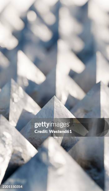3d Rendering Of Metallic Geometric Pyramid Shapes In A Repeating ...