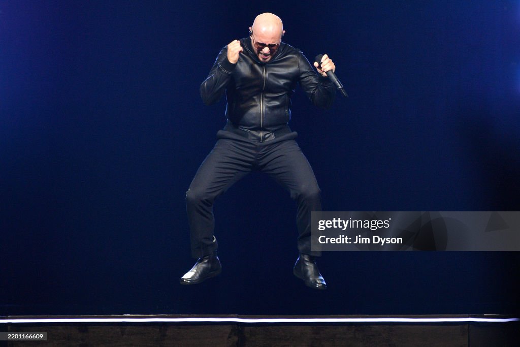 Pitbull Rapper Performance Rapper Pitbull performs at the O2 Arena during his 'Party After Dark ...