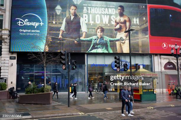 Digital billboard for Steven Knight's period drama about Victorian boxing which streams on Disney+, is seen above Piccadilly Circus, on 24th February...