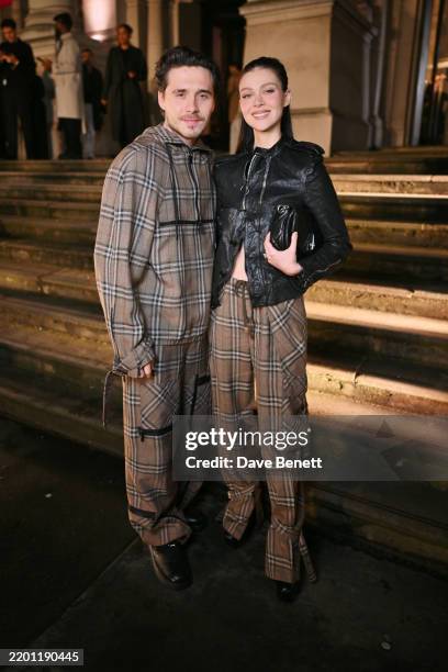 Brooklyn Beckham and Nicola Peltz attend the Burberry Winter 2025 show during London Fashion Week on February 24, 2025 in London, England.
