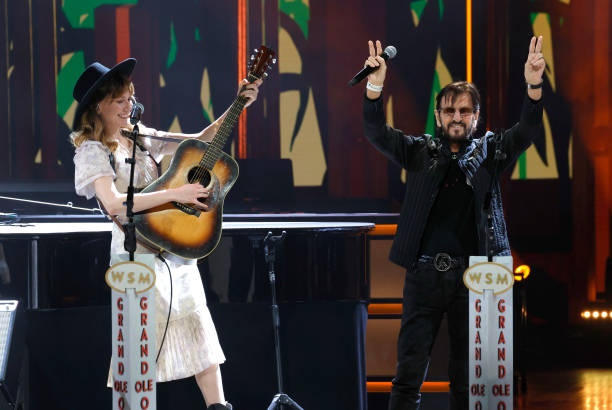 Molly Tuttle and Ringo Starr perform at The Grand Ole Opry on February 21, 2025 in Nashville, Tennessee.