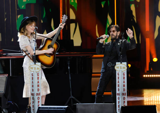 Molly Tuttle and Ringo Starr perform at The Grand Ole Opry on February 21, 2025 in Nashville, Tennessee.