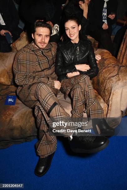 Brooklyn Beckham and Nicola Peltz attend the Burberry Winter 2025 show during London Fashion Week on February 24, 2025 in London, England.