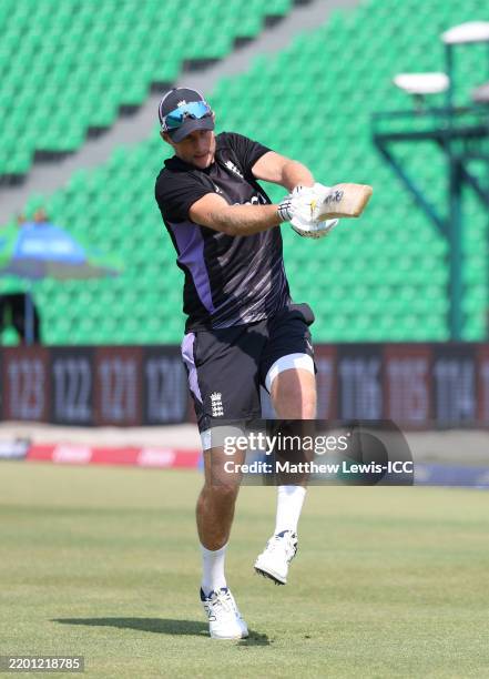 Joe Root of England warms up ahead of the ICC Champions Trophy 2025 match between Australia and England at Gaddafi Stadium on February 22, 2025 in...