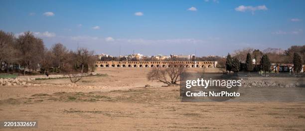 View of the dried-up Zayandeh Rud river and the Si-o-se-pol historical bridge is pictured in Isfahan, Iran, on February 22, 2025. Zayandeh Rud is one...