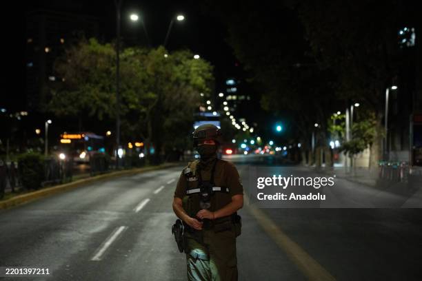 Chilean police carry out controls during curfew after massive power outage that left almost 20 million people without electricity in Santiago, Chile...