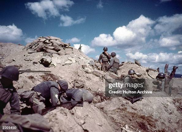 US soldiers dig in to a hill in Korea during the Korean war . News ...