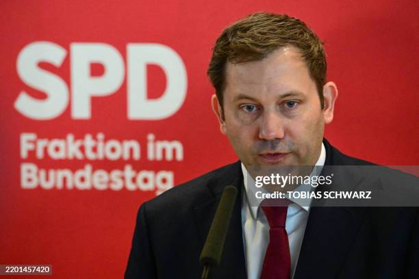 Lars Klingbeil, co-leader of Germany's Social Democratic Party and newly elected parliamentary group leader celebrates speaks to journalists after a...
