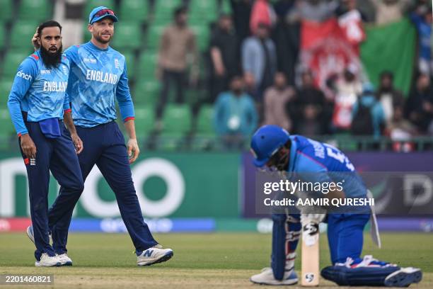 Eng Rashid Rss England's Adil Rashid celebrates with captain Jos Buttler after... News ...