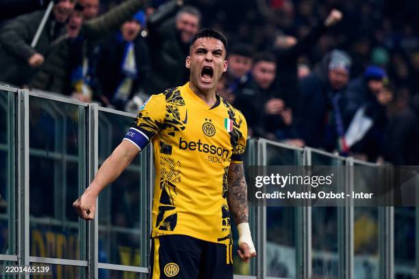 Lautaro Martinez of FC Internazionale celebrates with teammates after scoring his team's first goal during the Serie match between Inter and Genoa at...