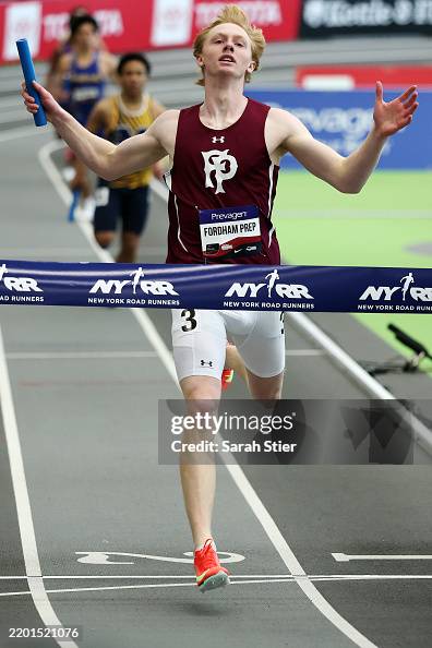 Kaiden Rusk Kaiden Rusk of Fordham Prep crosses the finish line to win the CHSAA ...