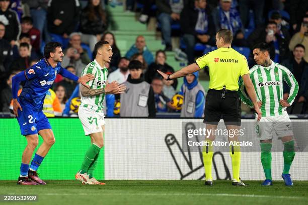 Antony of Real Betis reacts towards referee Javier Alberola Rojas, after receiving a red card during the LaLiga match between Getafe CF and Real...