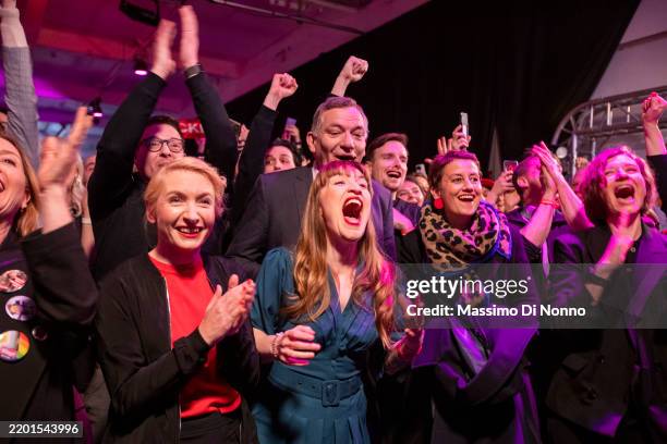 Die Linke co-leaders Jan van Aken, Ines Schwerdtner and Heidi Reichinnek cheer after the first election results at the Die Linke election evening...