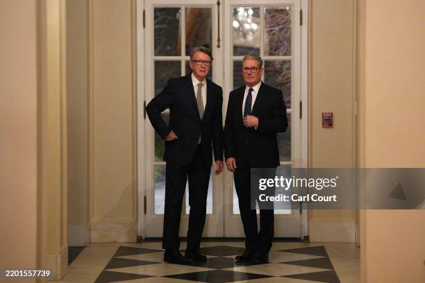 British Prime Minister Keir Starmer talks with Britain's ambassador to the United States Peter Mandelson during a welcome reception at the...