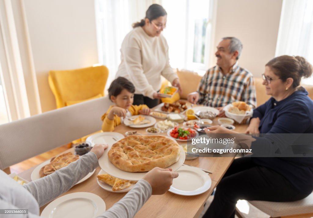 Turkish family eating breakfast at home