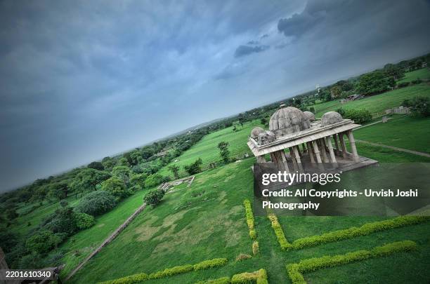 champaner kevda mosque pavilion on green field - gujarat stock pictures, royalty-free photos & images