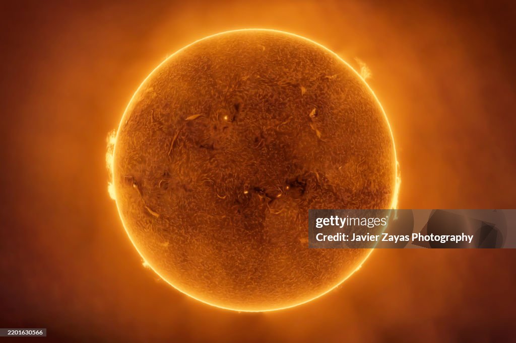 Our Sun in H-alpha Light. Sun emitting solar flares in H-alpha light wavelength