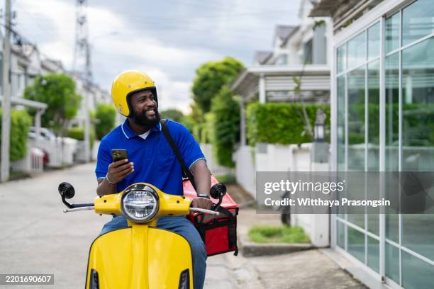 African Delivery Rider 124 African Delivery Motorbike Stock Photos, High-Res Pictures, and ...