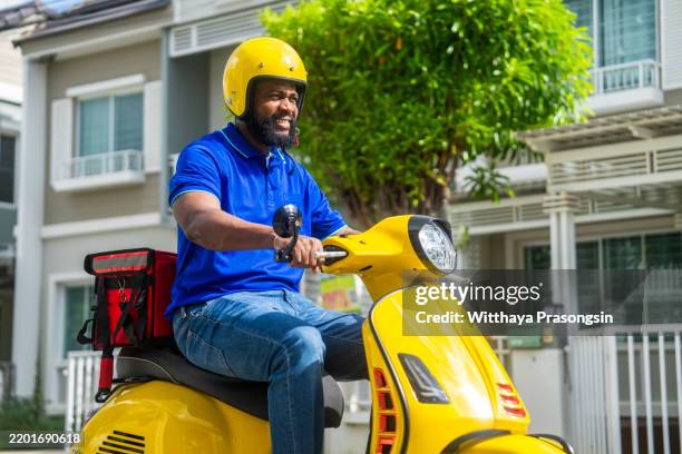 African Delivery Rider 123 African Delivery Motorbike Stock Photos, High-Res Pictures, and ...