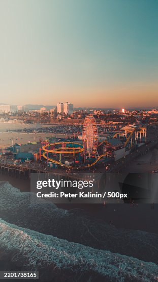High angle view of illuminated city by sea against sky,Santa Monica,California,United States,USA High angle view of illuminated city by sea against sky,Santa Monica,California,United States,USA