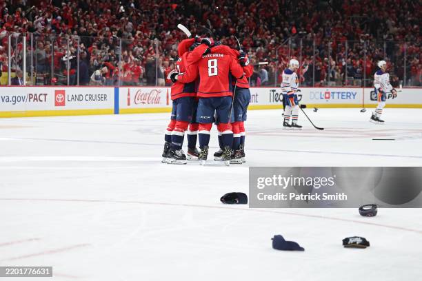 Alex Ovechkin of the Washington Capitals celebrates after scoring an empty net goal for a hat-trick against the Edmonton Oilers during the third...