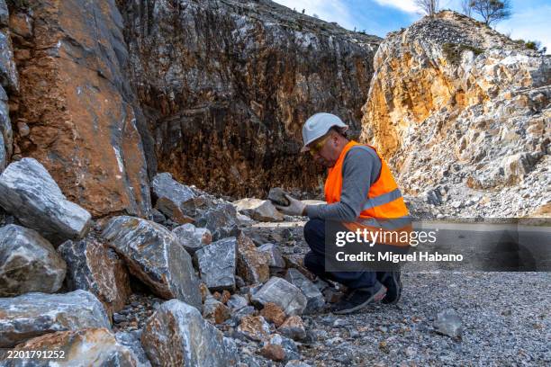geologist inspecting a mine,explorers collect soil samples in search of minerals. - geologist stock pictures, royalty-free photos & images