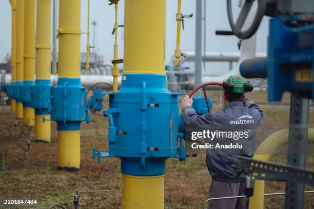 Worker carries out daily tasks at the Eustream gas facility on February 28, 2025 in Velke Kapusany, Slovakia. Ukraine's pipeline network has long...