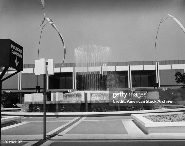 Fountain outside the Los Angeles Convention Center in Downtown Los Angeles, California, circa 1975. Completed in '71, the building was designed by...