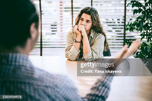 A boss and an employee in the middle of an argument A boss and an employee in the middle of an argument