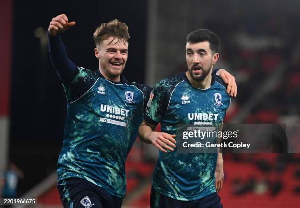 Finn Azaz of Middlesbrough celebrates scoring his team's second goal with teammate Tommy Conway during the Sky Bet Championship match between Stoke...