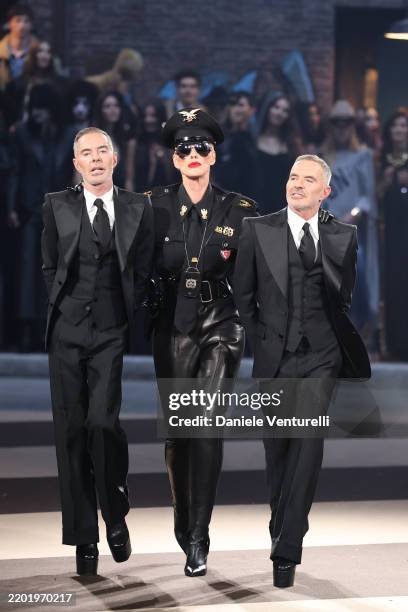 Dean Caten, Brigitte Nielsen and Dan Caten walk the runway at the Dsquared2 fashion show during the Milan Fashion Week - Womenswear Fall/Winter...