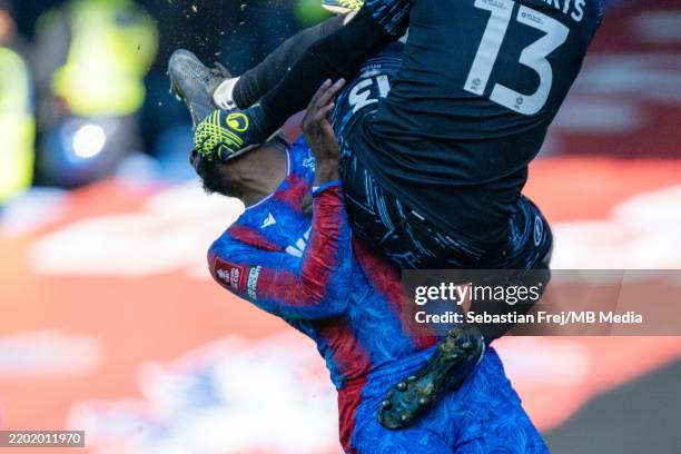 Jean-Philippe Mateta of Crystal Palace injured by a kick in the face by Millwall goalkeeper during the Emirates FA Cup Fifth Round match between...