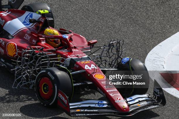 Aero rakes are seen on the car of Lewis Hamilton of Great Britain driving the Scuderia Ferrari SF-25 during day one of F1 Testing at Bahrain...
