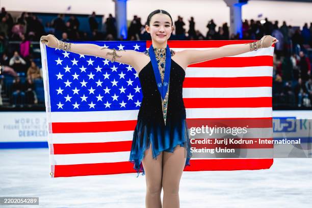 Bronze medal winner Elyce Lin-Gracey of United States poses with medal during medal ceremony after ISU World Junior Figure Skating Championships -...