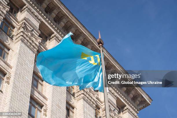 Flag of the Crimean Tatar waves next to City State Administration on February 26, 2025 in Kyiv, Ukraine. On February 26 President Volodymyr Zelenskyi...