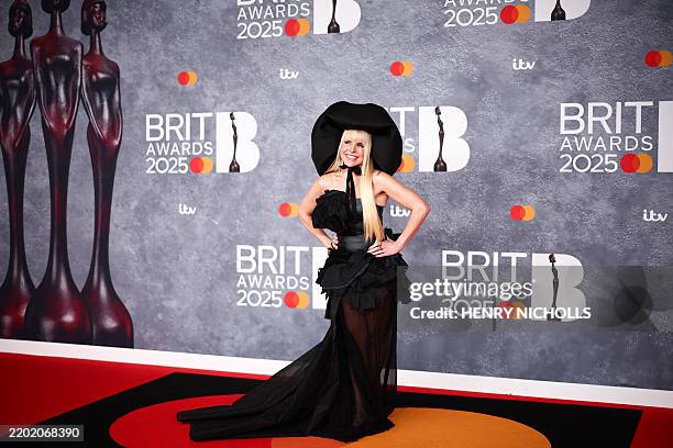 British singer Paloma Faith poses on the red carpet upon arrival for the BRIT Awards 2025 in London on March 1, 2025. / RESTRICTED TO EDITORIAL USE...