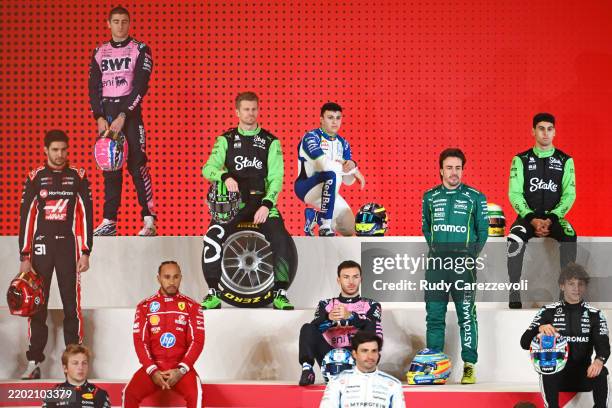 Esteban Ocon of France and Haas F1, Jack Doohan of Australia driving the Alpine F1 A525 Renault, Lewis Hamilton of Great Britain and Scuderia...