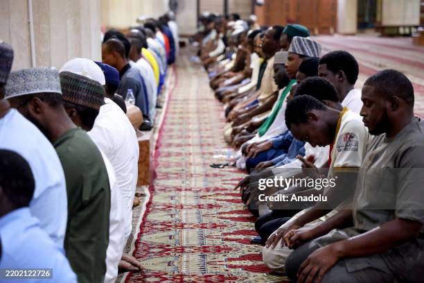 Muslims perform the first tarawih prayer of the holy month of the Ramadan at the Abuja National Mosque in Abuja, Nigeria on March 01, 2025.