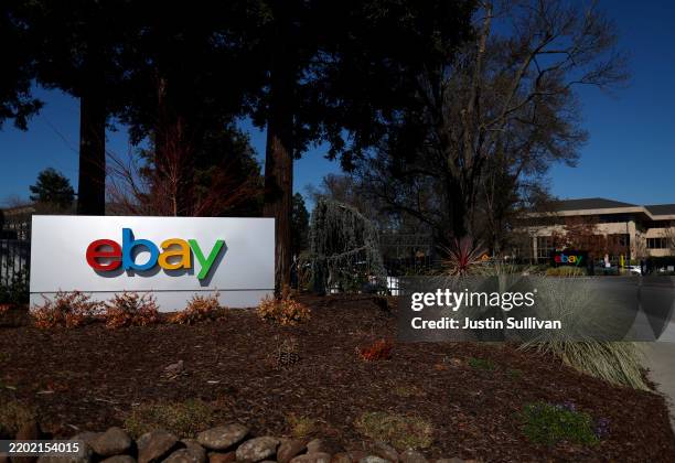 The eBay logo is displayed on a sign in front of eBay headquarters on February 26, 2025 in San Jose, California. Online marketplace eBay will report...