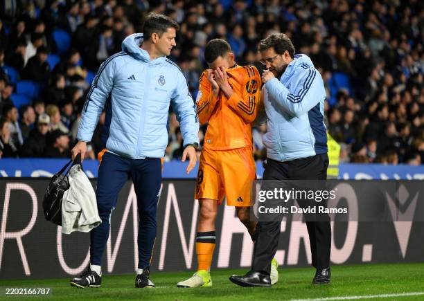 Dani Ceballos of Real Madrid reacts with an injury as he leaves the pitch during the Copa del Rey Semi Final match between Real Sociedad and Real...
