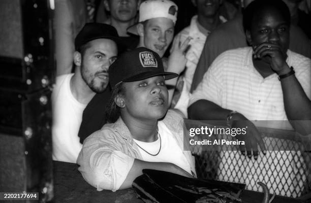 Rapper Yo-Yo wears a baseball cap that reads "Fuck What Ya Heard" when she watches House of Pain perform before she performs at The Ritz on June 19,...