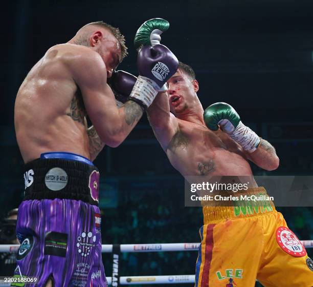 Paddy Boxing Paddy Donovan punches Lewis Crocker during their Welterweight fight ...