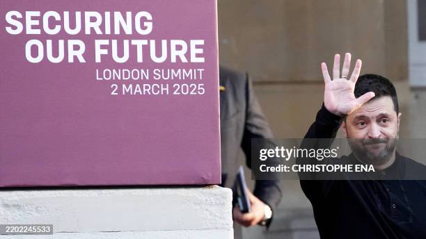 Ukraine's President Volodymyr Zelensky waves as he leaves after attending a summit held at Lancaster House in central London on March 2, 2025. UK...