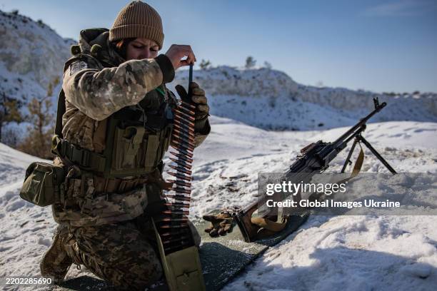 Ukrainian soldiers practice firing PKM machine gun on February 24, 2025 in Donetsk Oblast, Ukraine. The PKM machine gun is a powerful weapon that is...