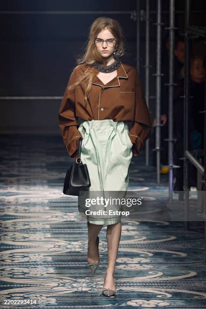 Model walks the runway at the Prada fashion show during the Milan Fashion Week - Womenswear Fall/Winter 2025/2026 on February 27, 2025 in Milan,...