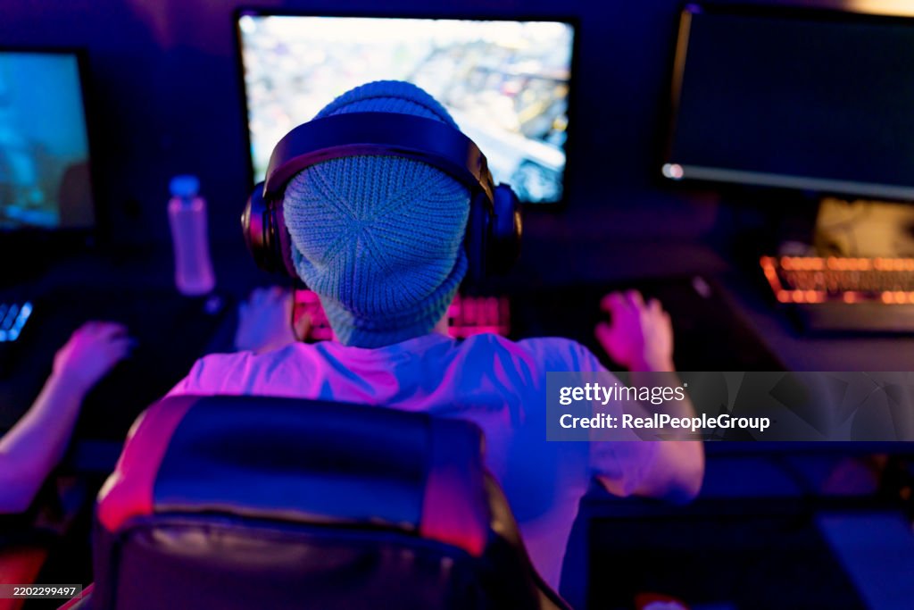 Professional Gamer Playing on His Powerful Personal Computer