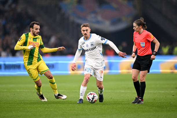 Stephanie FRAPPART - 05 Pedro CHIRIVELLA - 21 Valentin RONGIER during the Ligue 1 McDonald's match between Marseille and Nantes at Orange Velodrome...