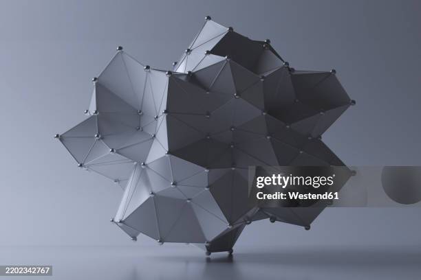 abstract geometric metal sculpture with connected dots - installationskunst stock-fotos und bilder