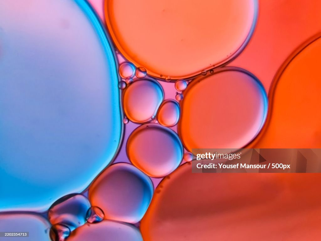 Full frame shot of oil bubbles in water